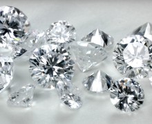Round brilliant polished diamonds.